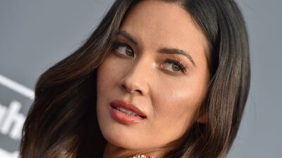 Actress Olivia Munn attends the 23rd annual Critics' Choice Awards at Barker Hangar on January 11, 2018, in Santa Monica, California. Keep clicking to see more photos of Munn through the years.