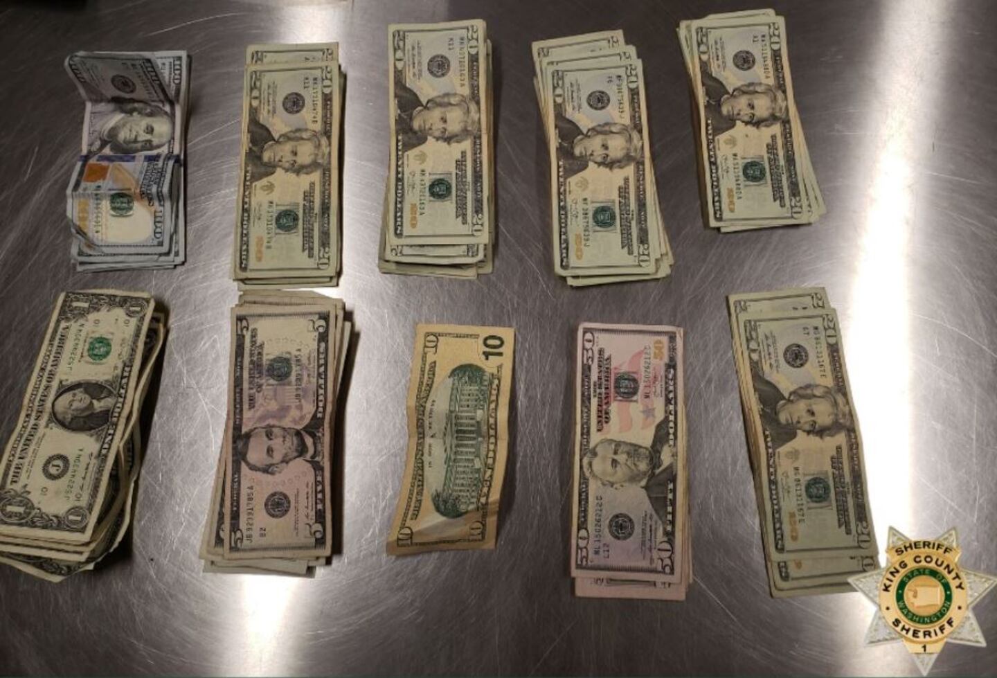 Deputies said a search of the man found more than $2,400 in cash and two bags of pills.