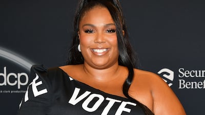 In this image released on October 14, Lizzo poses backstage at the 2020 Billboard Music Awards, broadcast on October 14, 2020, at the Dolby Theatre in Los Angeles, Calif.