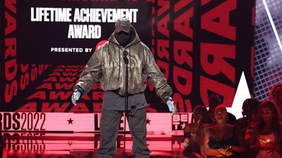 LOS ANGELES, CALIFORNIA - JUNE 26: Kanye West speaks onstage during the 2022 BET Awards at Microsoft Theater on June 26, 2022 in Los Angeles, California. (Photo by Leon Bennett/Getty Images for BET)