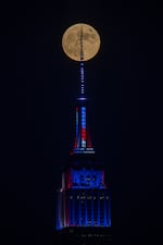 Full moon rises over the Empire State Building in New York City, United States, on July 4, 2020.