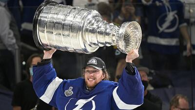 Tampa Bay Lightning goaltender Andrei Vasilevskiy hoists the Stanley Cup after the team defeated the Montreal Canadiens in Game 5 of the NHL hockey Stanley Cup finals, Wednesday, July 7, 2021, in Tampa, Fla.