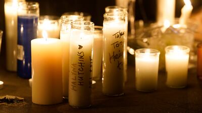 Candles flicker during a vigil for the late cinematographer Halyna Hutchins, Sunday, Oct. 24, 2021, in Burbank, Calif. A prop firearm discharged last Thursday by actor Alec Baldwin, while producing and starring in a Western movie in Santa Fe, N.M., killed Hutchins and wounded director Joel Souza.