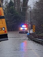 A school bus got stuck in floodwaters in Olympia when it tried to turn around.