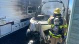 Snohomish firemen battle boat fire in Lake Stevens