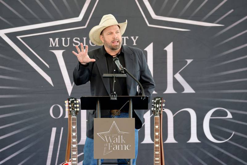 NASHVILLE, TENNESSEE - MAY 04: Garth Brooks speaks at the 2023 Music City Walk of Fame Induction ceremony at Music City Walk of Fame on May 04, 2023 in Nashville, Tennessee. (Photo by Jason Kempin/Getty Images)
